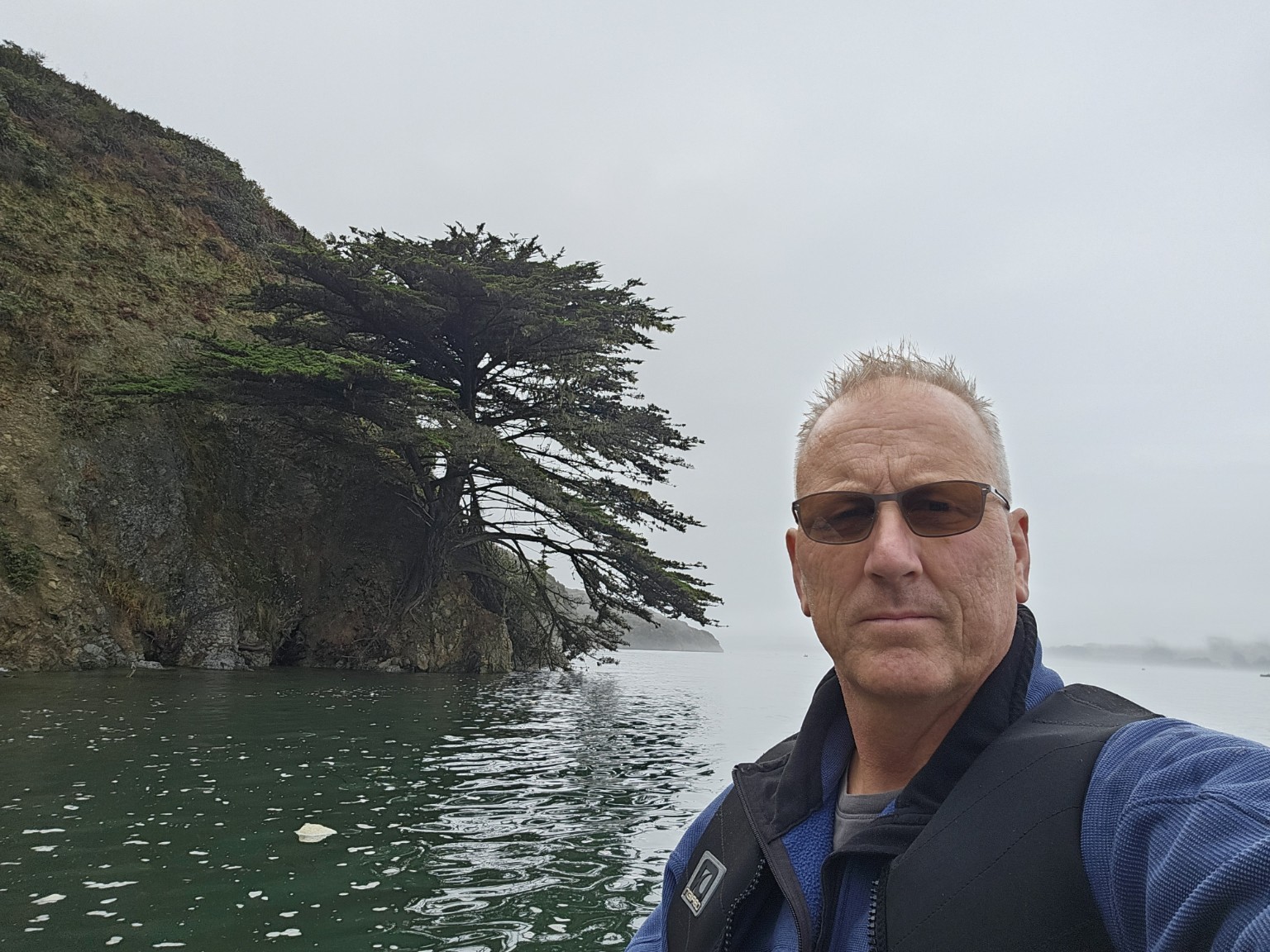 Landscape designer Clayton J. Winter outdoors in a natural setting